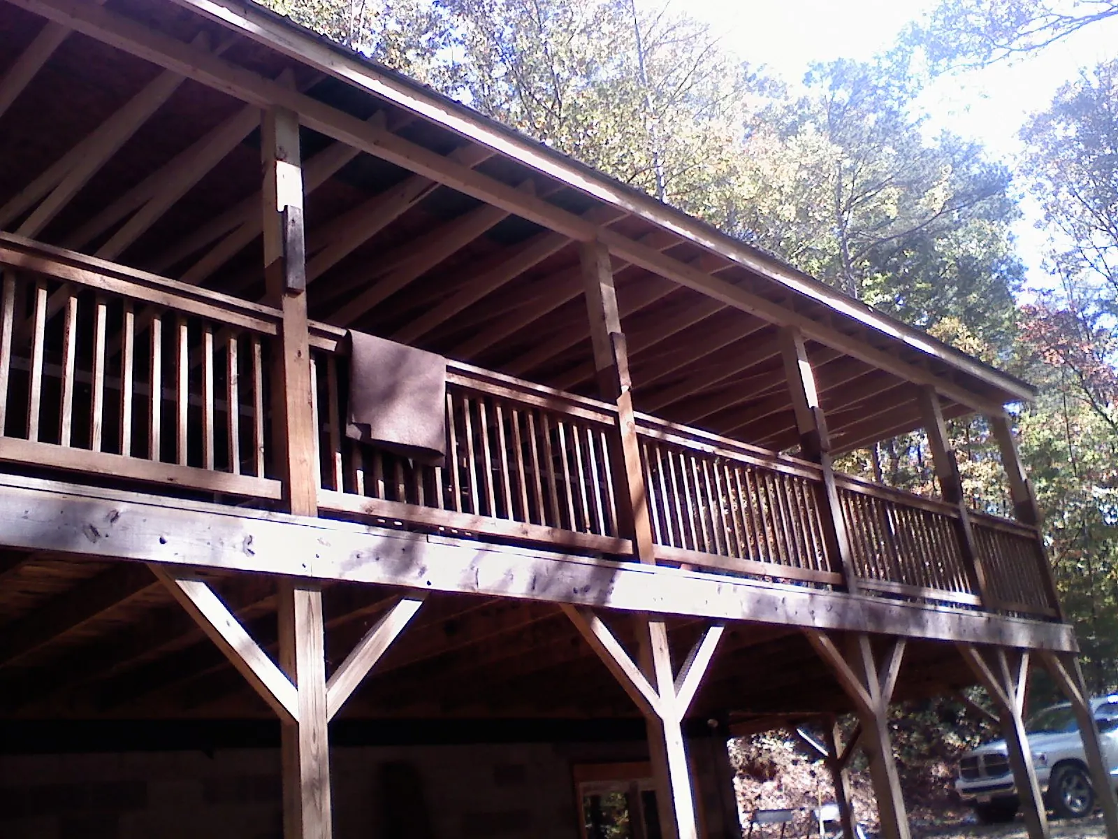 Timber framing under a new elevated porch and deck — Roof Leak Repair in Iron Ridge by Roofing Brothers